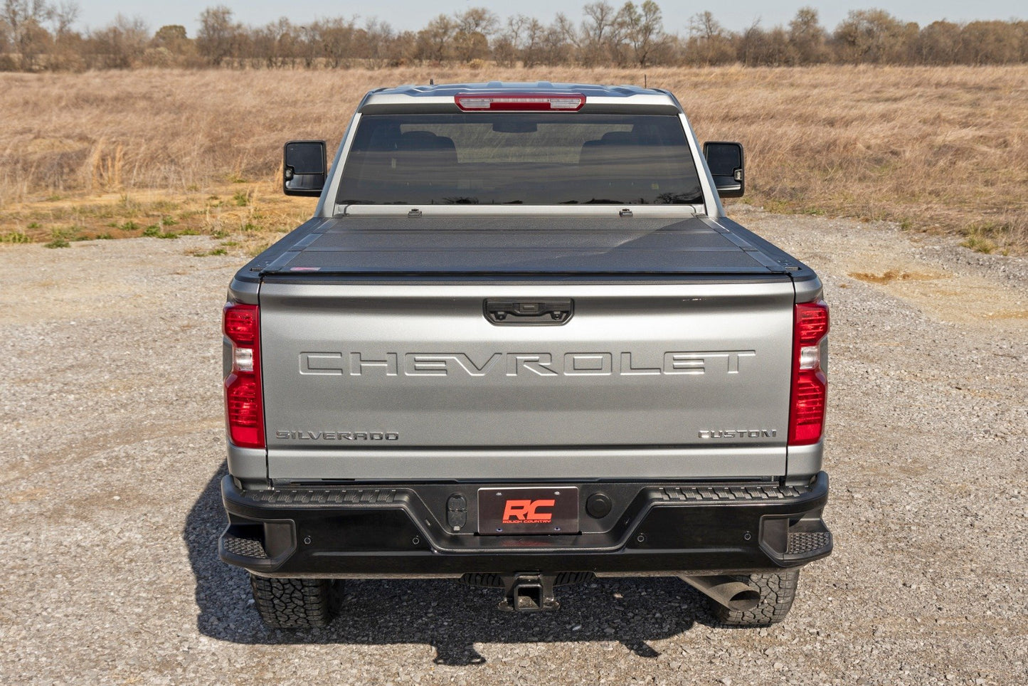 Hard Tri-Fold Flip Up Bed Cover | 6'9" Bed | Chevy/GMC Silverado/Sierra 2500HD/3500HD (20-25)